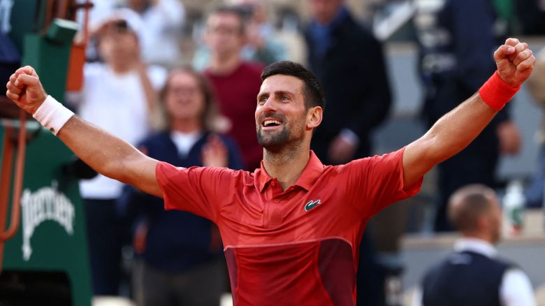 Serbia's Novak Djokovic celebrates after winning against Argentina's Francisco Cerundolo at the end of their men's singles round of sixteen match on Court Philippe-Chatrier on day nine of the French Open tennis tournament at the Roland Garros Complex in Paris on June 3, 2024. (Photo by Emmanuel Dunand / AFP) (Photo by EMMANUEL DUNAND/AFP via Getty Images)