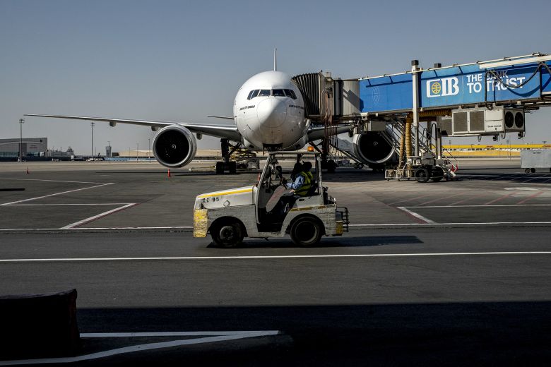 An Emirates Boeing 777-200 aircraft on the tarmac at Cairo International Airport, Africa's busiest airport.