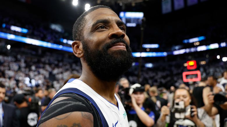 Kyrie Irving of the Dallas Mavericks celebrates after a victory against the Minnesota Timberwolves in Game Five of the Western Conference Finals at Target Center in Minneapolis, Minnesota on May 30, 2024.