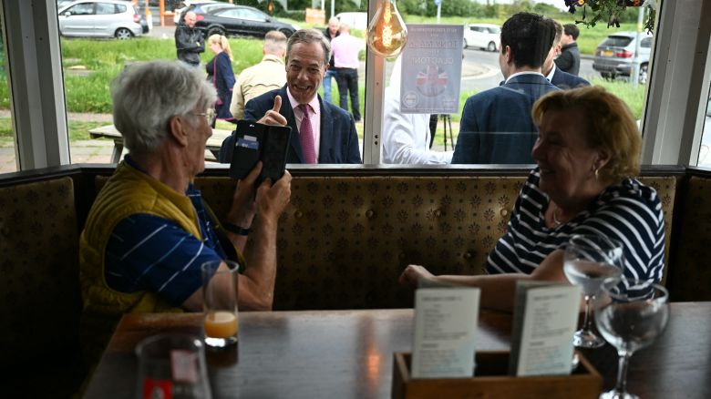 Newly appointed leader of Britain's right-wing populist party, Reform UK, and the party's parliamentary candidate for Clacton, Nigel Farage, poses for a photograph during his general election campaign launch, in Clacton-on-Sea, eastern England, on June 4, 2024. Nigel Farage on Monday said he would stand as a candidate for the anti-immigration Reform UK party in Britain's general election next month, after initially ruling out running. "I have changed my mind... I am going to stand," Farage, 60, told a news conference. He will seek election on July 4 in the fiercely pro-Brexit seat of Clacton, southeast England. (Photo by Ben Stansall / AFP) (Photo by BEN STANSALL/AFP via Getty Images)