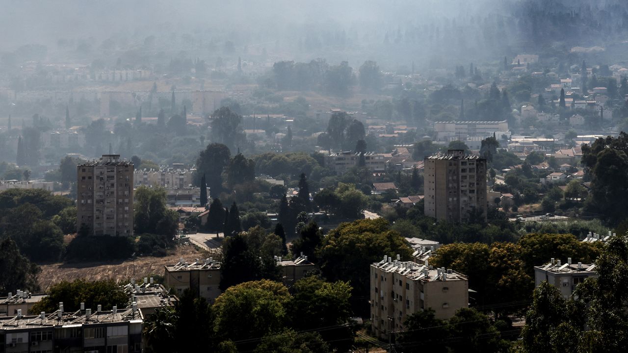 Smoke billows as a result of rockets launched from Lebanon into northern Israel, next to the city of Kiryat Shmona by the border with Lebanon, on June 4, 2024, amid ongoing cross-border clashes between Israeli troops and Hezbollah fighters. Since the outbreak of war between the Palestinian militant group Hamas and Israel on October 7, the Lebanese-Israeli border area has witnessed near-daily exchanges of fire, mainly between the Israeli army and Hamas ally Hezbollah. (Photo by JACK GUEZ / AFP) (Photo by JACK GUEZ/AFP via Getty Images)