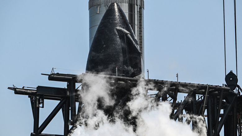 The SpaceX Starship is seen as it stands near the launchpad ahead of its fourth flight test from Starbase in Boca Chica, Texas on June 4, 2024. Starship, the world's most powerful rocket, is set for its next test flight on June 5, SpaceX announced on June 4.
The launch window from the company's Starbase in Boca Chica, Texas opens at 7:00 am local time (1200 GMT), pending regulatory approval.
It will be the fourth test for the sleek mega rocket, which is vital to NASA's plans for landing astronauts on the Moon later this decade, and to SpaceX CEO Elon Musk's hopes of eventually colonizing Mars. (Photo by CHANDAN KHANNA / AFP) (Photo by CHANDAN KHANNA/AFP via Getty Images)