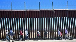 TOPSHOT - Migrants walk on the US side of the border wall in Jacumba Hot Springs, California on June 5, 2024, after crossing from Mexico. Migrants from countries such as Turkey, Jordan, Guatemala, Nicaragua, China and India made their way on foot into the United States today before being met with by Customs and Border Patrol agents for processing. The United States will temporarily close its Mexico border to asylum seekers starting today, June 5, as President Joe Biden as tries to neutralize his political weakness on migration ahead of November's election battle with Donald Trump.
The 81-year-old Democrat signed a long-awaited executive order taking effect at midnight to "gain control" of the southern frontier with Mexico, after record numbers of illegal border crossings sparked concerns among voters. (Photo by Frederic J. BROWN / AFP) (Photo by FREDERIC J. BROWN/AFP via Getty Images)