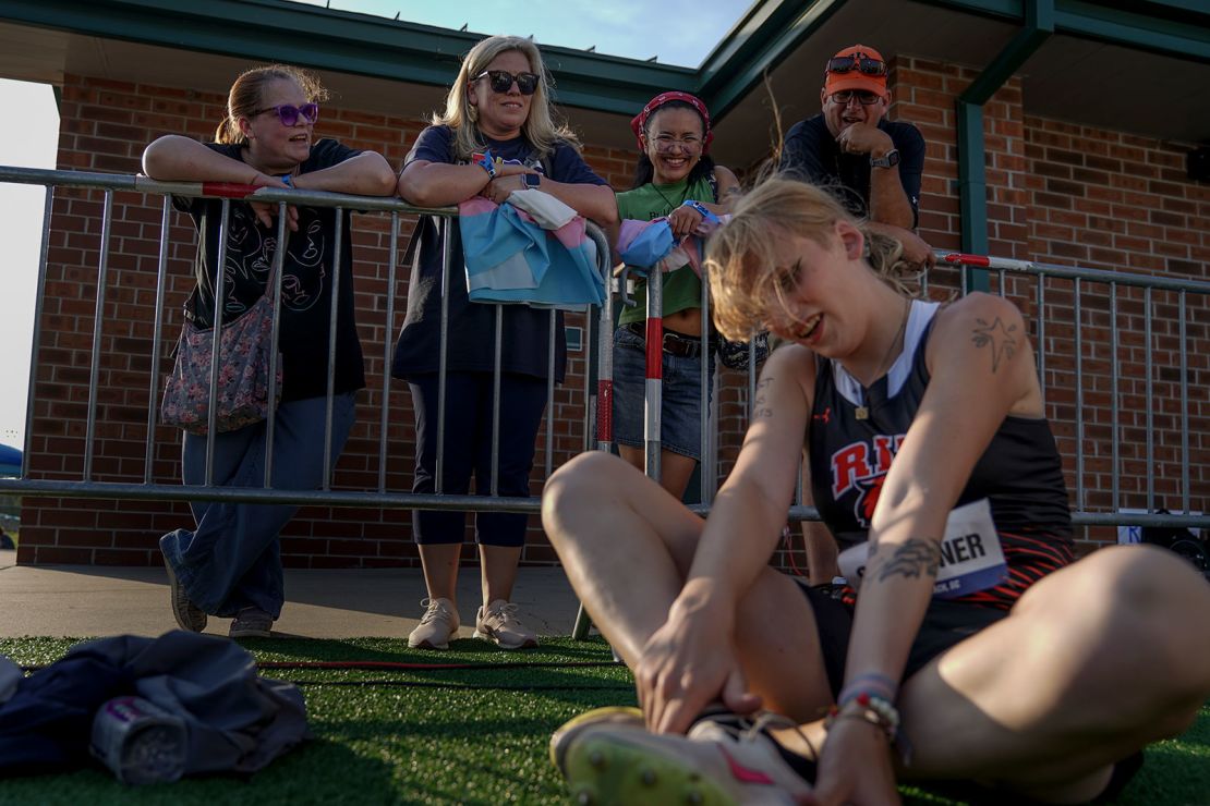 Schreiner, with some of her support group, when she ran for the Rochester Institute of Technology. From left: her aunt Jenn Reynolds, mother Sasha Armant, boyfriend Ace Quiampang, and head track coach David Warth.