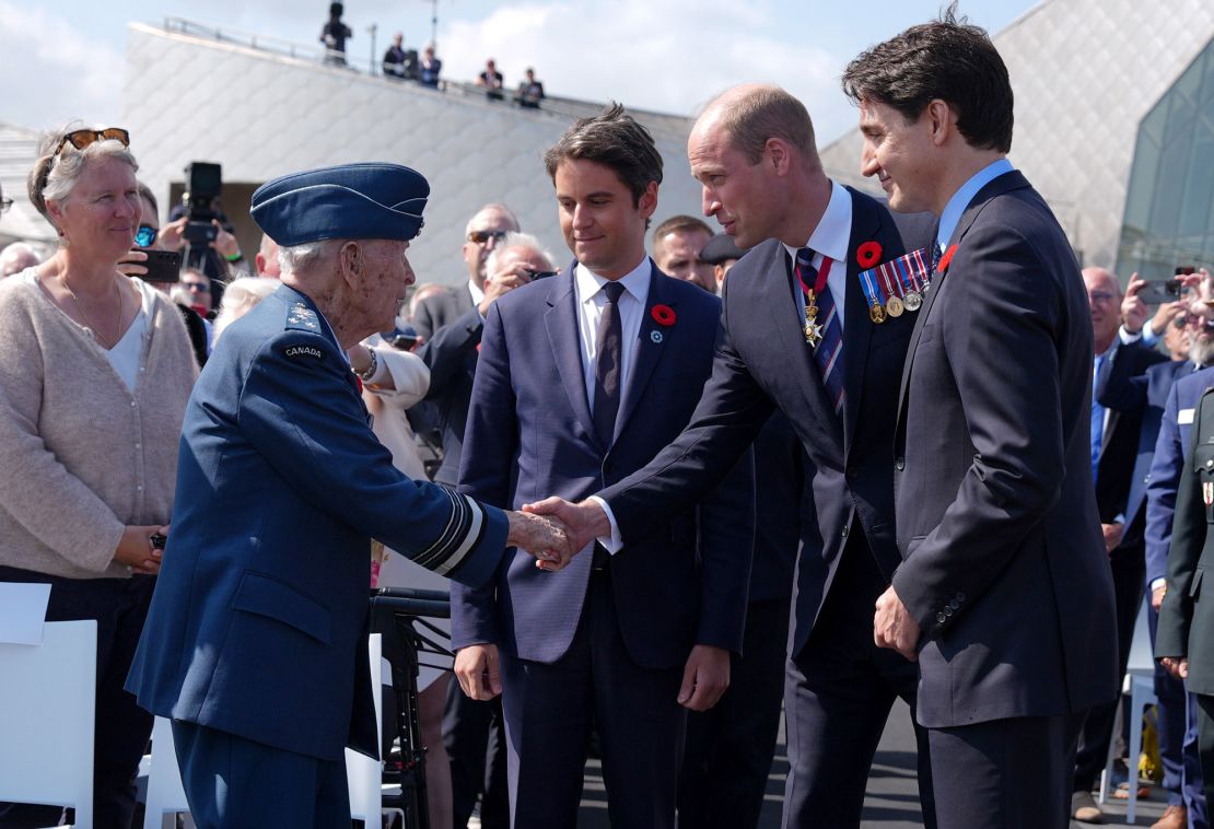 Prince William meets Richard Rohmer, 100, one of the most decorated Canadian veterans, accompanied by the Prime Minister of France Gabriel Attal and Canadian Prime Minister Justin Trudeau during the Canadian government ceremony at Juno Beach on Thursday. 