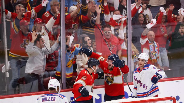 Vladimir Tarasenko of the Florida Panthers, second from right, celebrates with teammate Anton Lundell after Tarasenko's goal against the New York Rangers during Game Six of the Eastern Conference Final of the 2024 Stanley Cup Playoffs at Amerant Bank Arena in Sunrise, Florida on June 01, 2024.