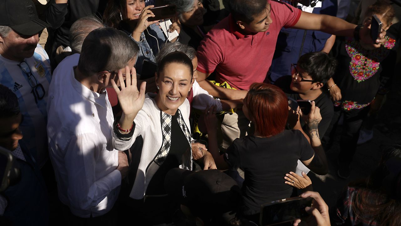 MEXICO CITY, MEXICO - JUNE 02:  Presidential candidate Claudia Sheinbaum of ''Sigamos Haciendo Historia'' coalition arrives to the polling station to cast her vote during the presidential elections at Alcaldia Tlalpan on June 02, 2024 in Mexico City, Mexico. According to the Instituto Nacional Electoral (INE) over 100 million people are allowed to vote on the 2024 Presidential Election in Mexico. Claudia Sheinbaum of the Sigamos Haciendo Historia coalition, Xochitl Galvez of Fuerza y Corazón por México coalition and Jorge Alvarez Maynez of Movimiento Ciudadano will participate as the candidates for the presidency. (Photo by Cristopher Rogel Blanquet/Getty Images)