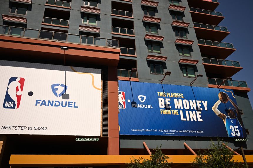 A sign on a building in Phoenix promotes the NBA and FanDuel in 2024.