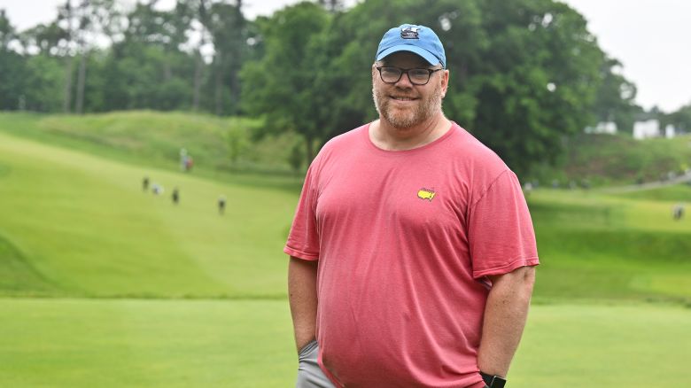 Paul Emerson, a fan, smiles for a photo after having caddied for C.T. Pan of Taiwan for a portion of the final round of the RBC Canadian Open at Hamilton Golf & Country Club on June 02, 2024 in Hamilton, Ontario, Canada.