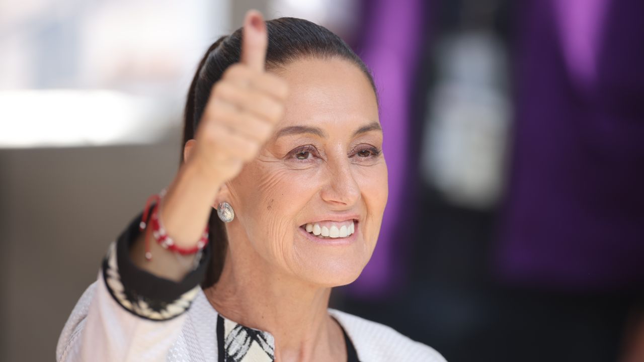 MEXICO CITY, MEXICO - JUNE 02: Presidential candidate Claudia Sheinbaum of ''Sigamos Haciendo Historia'' coalition shows her inked fingerprint after casting her vote during the presidential elections at Alcaldia Tlalpan on June 02, 2024 in Mexico City, Mexico. According to the Instituto Nacional Electoral (INE) over 100 million people are allowed to vote on the 2024 Presidential Election in Mexico. Claudia Sheinbaum of the Sigamos Haciendo Historia coalition, Xochitl Galvez of Fuerza y Corazón por México coalition and Jorge Alvarez Maynez of Movimiento Ciudadano will participate as the candidates for the presidency. (Photo by Hector Vivas/Getty Images)