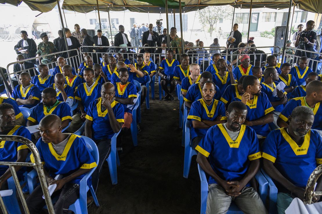 Counsellors and accused of a failed coup attempt sit at the first hearing of the trial at the Ndolo Prison in Kinshasa on June 7, 2024.