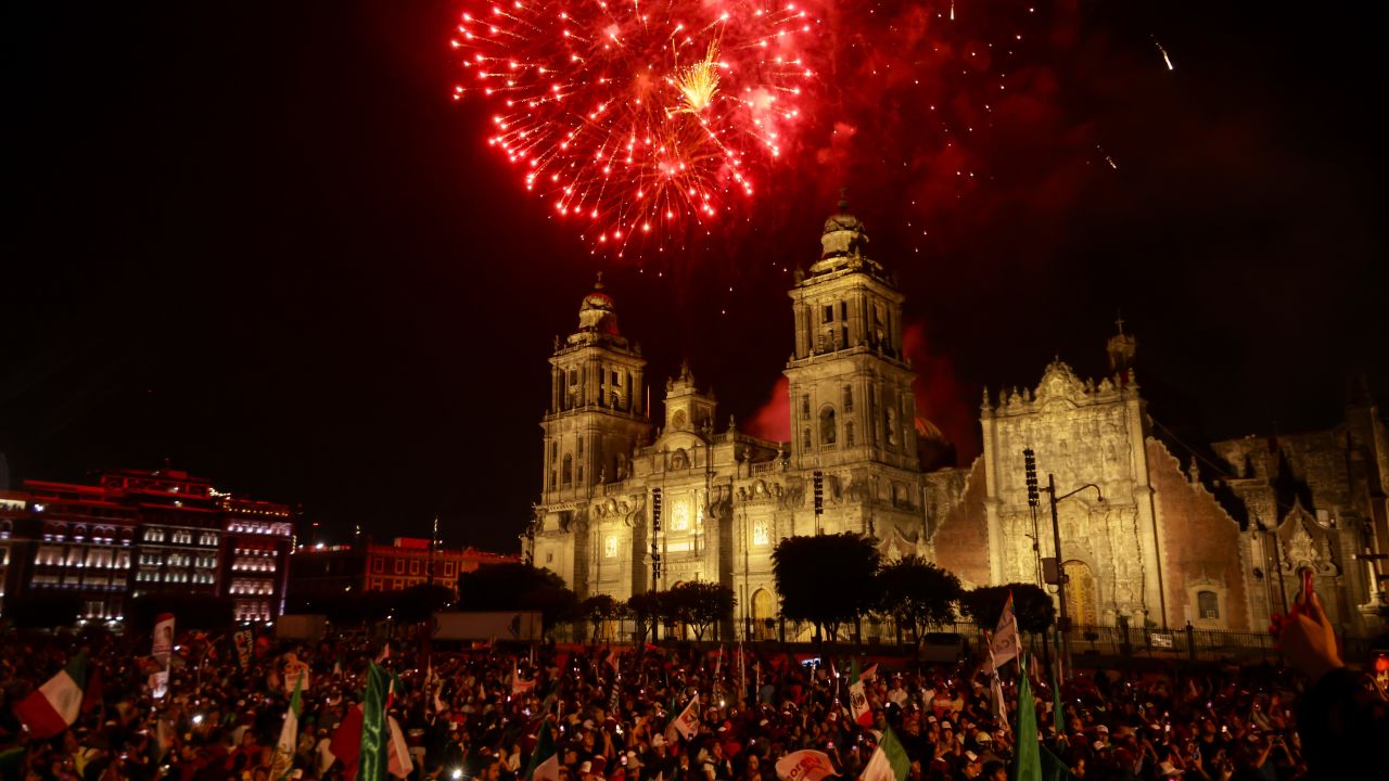 MEXICO CITY, MEXICO - JUNE 02: Fireworks are seen over the Mexico City Cathedral during a speech of Presidential candidate Claudia Sheinbaum of ''Sigamos Haciendo Historia'' after the first results released by the election authorities show that she leads the polls by wide margin after the presidential election at Zocalo Square on June 02, 2024 in Mexico City, Mexico. According to the Instituto Nacional Electoral (INE) over 100 million people were allowed to vote on the 2024 Presidential Election in Mexico. Claudia Sheinbaum of 'Sigamos Haciendo Historia' coalition will become the first woman president of Mexico. (Photo by Cristopher Rogel Blanquet/Getty Images)