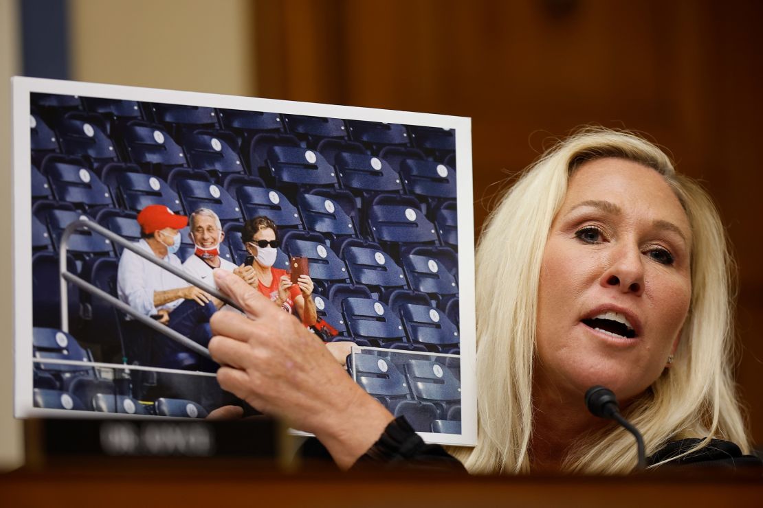 Rep. Marjorie Taylor Greene, a Georgia Republican,  points to a photograph of Dr. Anthony Fauci while questioning him during a hearing on June 3, 2024.