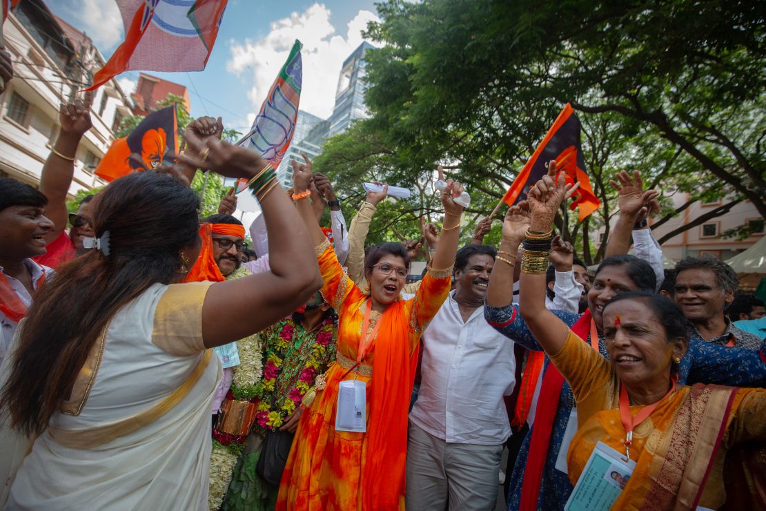 Supporters of the Bharatiya Janata Party (BJP) celebrate as they learn early election results on June 04, 2024 in Bengaluru, India.