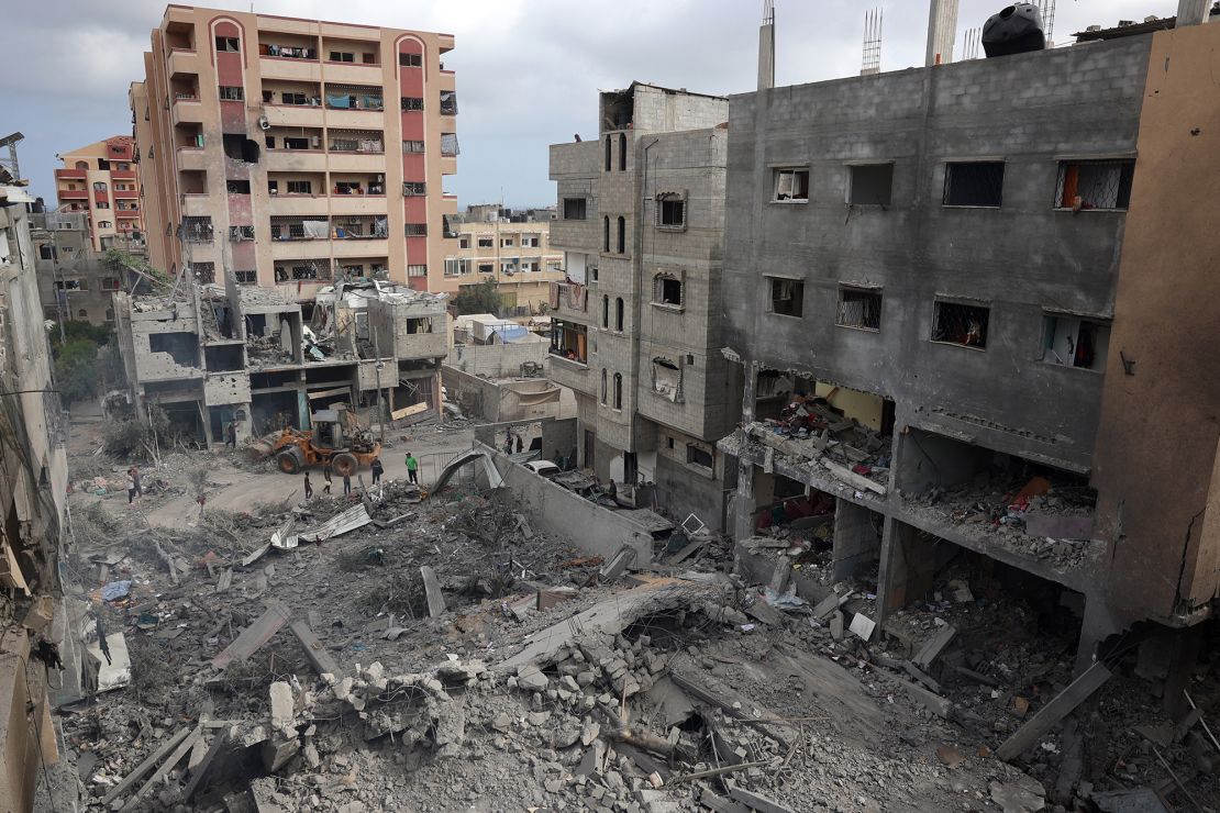 Palestinians inspect the damage a day after a deadly hostage rescue operation by Israeli forces in the Nuseirat refugee camp in central Gaza on June 9, 2024.