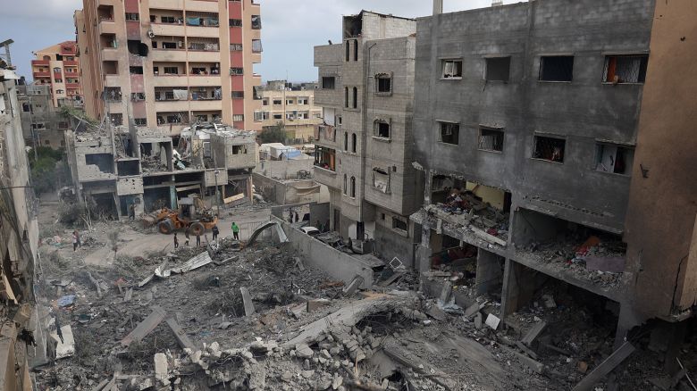 Palestinians inspect the damage and debris a day after an operation by the Israeli Special Forces in the Nuseirat camp, in the central Gaza Strip on June 9, 2024, amid the ongoing conflict between Israel and the Palestinian Hamas militant group. (Photo by Eyad BABA / AFP) (Photo by EYAD BABA/AFP via Getty Images)