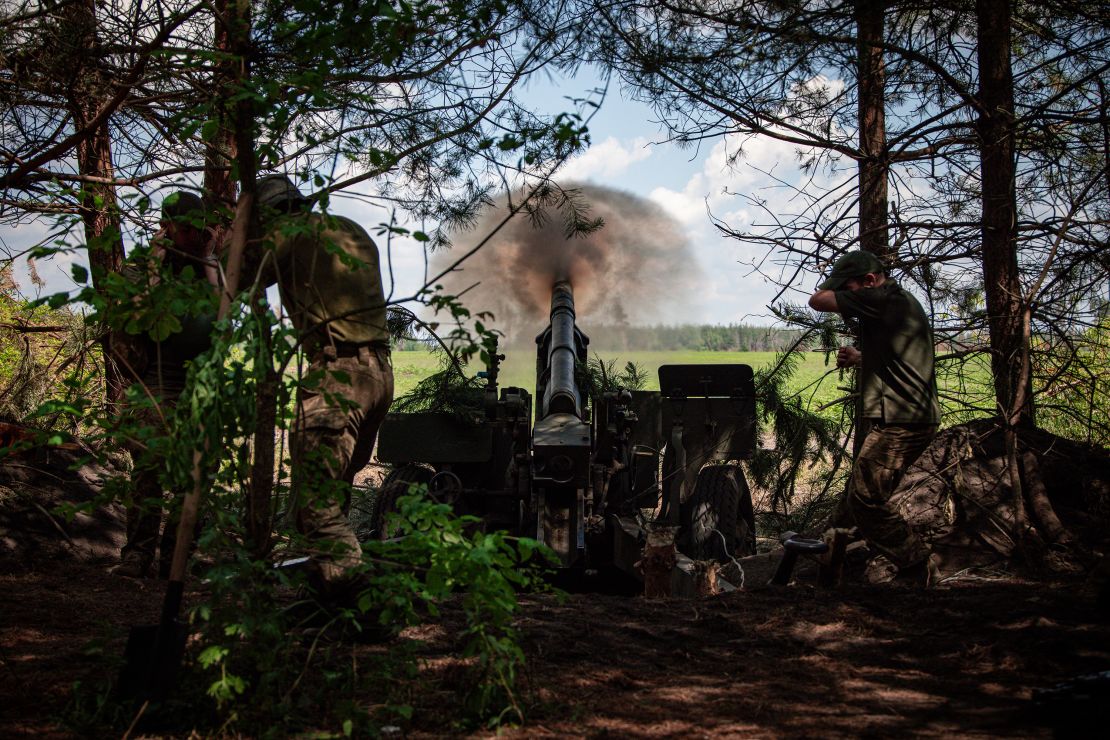 Ukrainian soldiers with the 57th Motorized Brigade operate at an artillery position on June 9, 2024 near Vovchansk, Kharkiv Region, Ukraine.