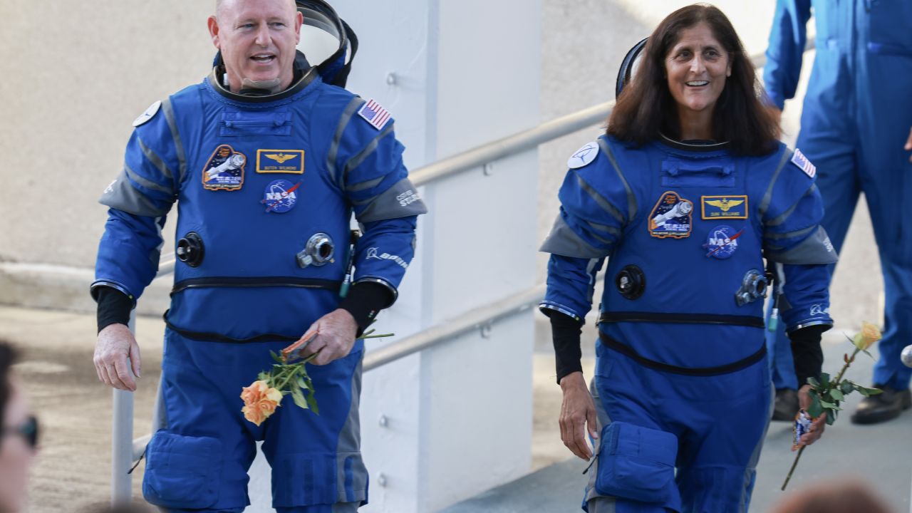 CAPE CANAVERAL, FLORIDA - JUNE 05:  NASA’s Boeing Crew Flight Test Commander Butch Wilmore (L) and Pilot Suni Williams walk out of the Operations and Checkout Building on June 05, 2024 in Cape Canaveral, Florida. The astronauts are heading to Boeing’s Starliner spacecraft, which sits atop a United Launch Alliance Atlas V rocket at Space Launch Complex 41 for NASA’s Boeing crew flight test to the International Space Station.  (Photo by Joe Raedle/Getty Images)