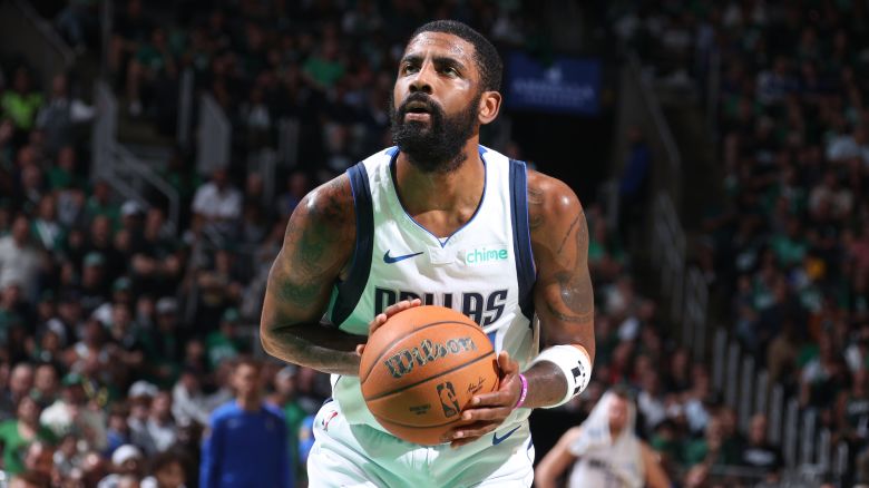 BOSTON, MA - JUNE 9: Kyrie Irving #11 of the Dallas Mavericks shoots a free throw during the game against the Boston Celtics during Game 1 of the 2024 NBA Finals on June 9, 2024 at the TD Garden in Boston, Massachusetts. NOTE TO USER: User expressly acknowledges and agrees that, by downloading and or using this photograph, User is consenting to the terms and conditions of the Getty Images License Agreement. Mandatory Copyright Notice: Copyright 2024 NBAE  (Photo by Nathaniel S. Butler/NBAE via Getty Images)