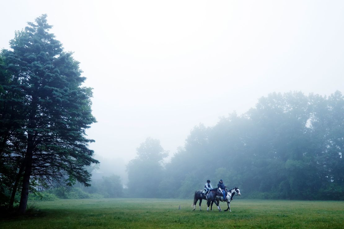 Seize the Grey, left, walks to his barn with trainer D. Wayne Lukas, right, after a morning workout prior to the Belmont Stakes at Saratoga Race Course on June 7, 2024, in Saratoga Springs, New York.