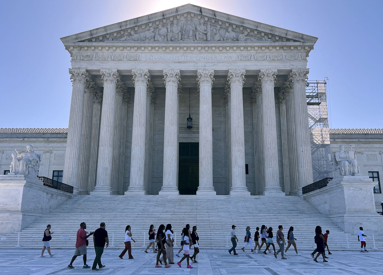 Tourists gather outside the Supreme Court on June 07, 2024 in Washington, DC.