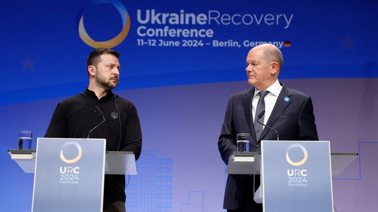 German Chancellor Olaf Scholz (R) and Ukrainian President Volodymyr Zelensky give a joint press conference during the Ukraine Recovery Conference in Berlin on June 11, 2024. The conference running from June 11 to 12, 2024 "is a continuation of the annual series of high-level political events dedicated to the swift recovery and long-term reconstruction of Ukraine since the beginning of Russia's full-scale war of aggression against Ukraine". (Photo by Odd ANDERSEN / AFP) (Photo by ODD ANDERSEN/AFP via Getty Images)