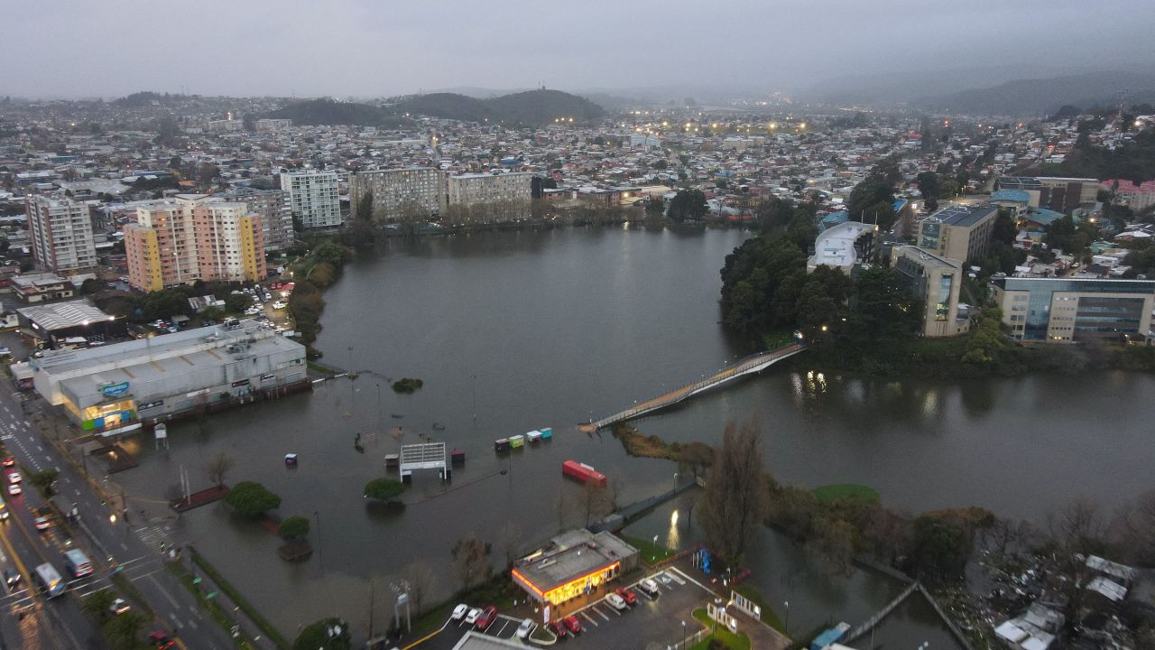 TOPSHOT - Aerial view of a flooded area in Concepcion, Bio Bio region, Chile on June 13, 2024. Heavy rains in central and southern Chile left one dead and more than 4,000 people affected, according to local authorities, who declared a state of "catastrophe" in five regions of the country. (Photo by GUILLERMO SALGADO / AFP) (Photo by GUILLERMO SALGADO/AFP via Getty Images)