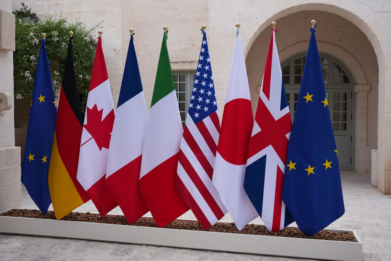 Flags representing the participants of the Group of Seven (G-7) leaders summit at the Borgo Egnazia resort in Savelletri, Italy, on June 13, 2024.