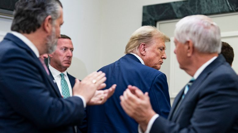 Former President Donald Trump, meets with Senate Republicans at the National Republican Senatorial Committee office in Washington, DC, on Thursday, June 13, 2024.
