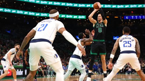 Kristaps Porziņģis shoots against the Dallas Mavericks during the first quarter in Game 2 of the 2024 NBA Finals.
