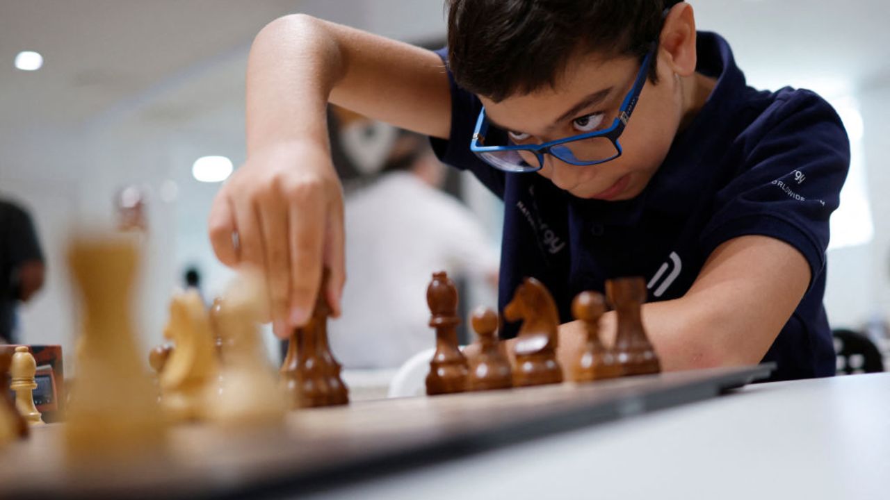 Argentinian chess player Faustino Oro, 10, plays a game during the Madrid Chess Festival, in Madrid on June 15, 2024. (Photo by OSCAR DEL POZO / AFP) (Photo by OSCAR DEL POZO/AFP via Getty Images)