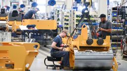 Workers are seen on an assembly line for compactors at Volvo Construction Equipment plant on Thursday June 6, 2024, in Shippensburg, Pennsylvania.