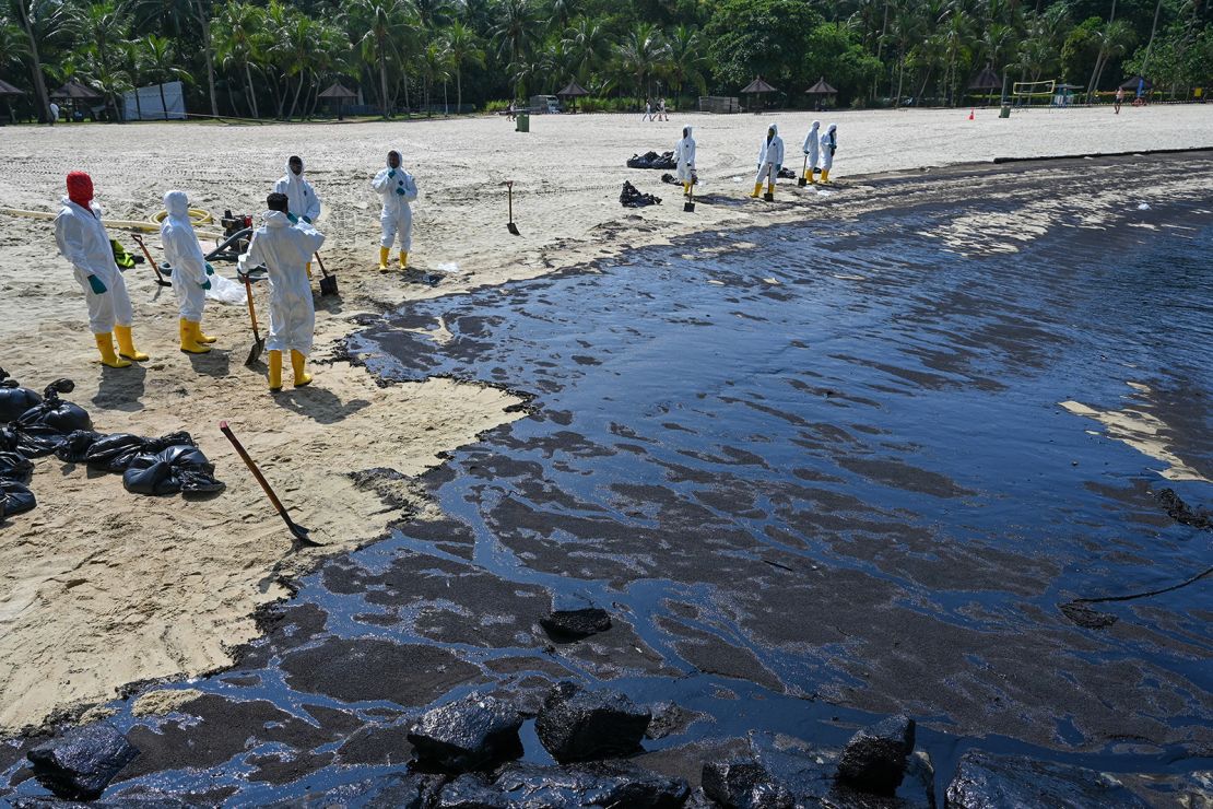 Oil covers Sentosa's Tanjong Beach in Singapore on June 16, 2024.