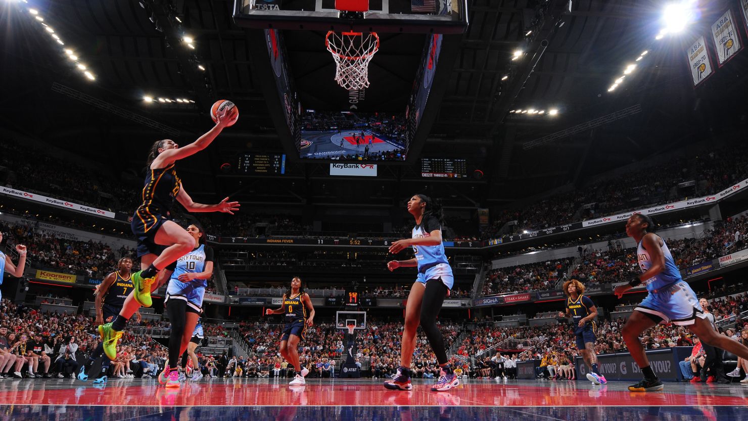 Caitlin Clark and Angel Reese renew rivalry as Indiana Fever defeats  Chicago Sky 91-83 | CNN
