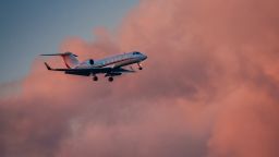 A Gulfstream G-IV private jet flies past clouds at sunset on approach to Washingtons Reagan National Airport on June 12, 2024, in Arlington, VA.