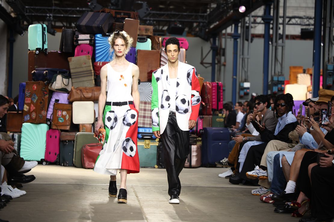 At Moschino, creative director Adrian Appiolaza debuted his first menswear collection featuring classic Italian scenes.