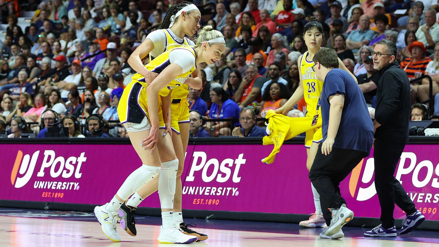 Los Angeles Sparks forward Cameron Brink was helped off the court on Tuesday after sustaining an injury.