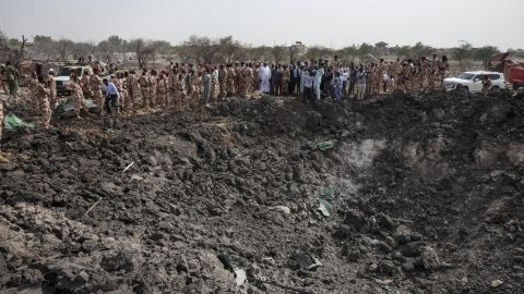 Members of the Chadian security forces stand at the scene of the fire at an ammunition depot in N'Djamena on June 19, 2024.