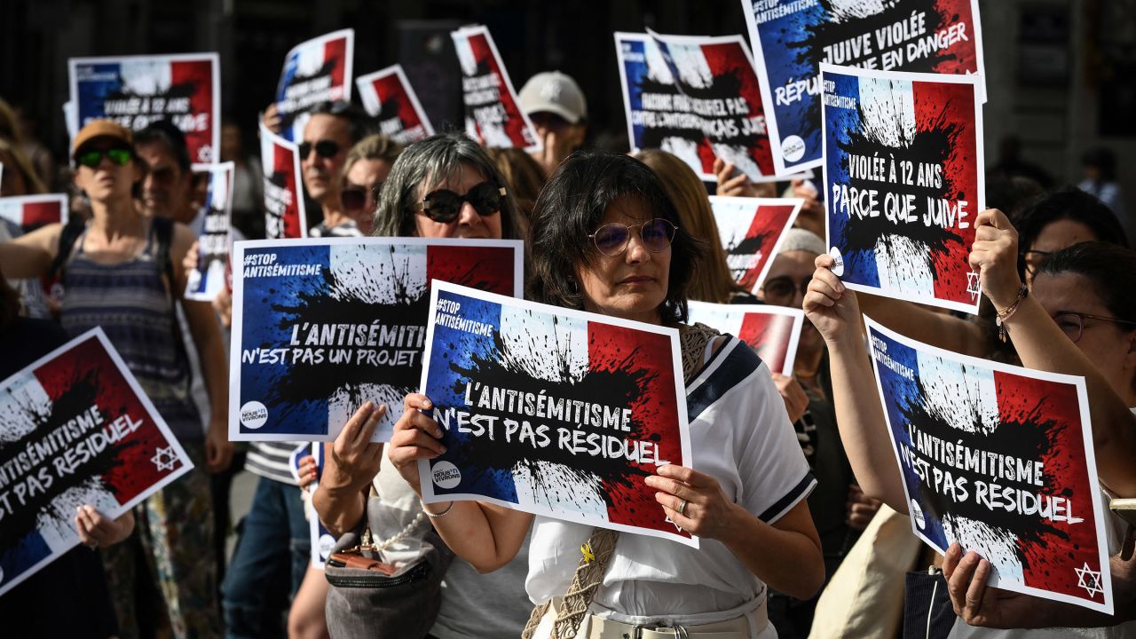 Protesters gather to condemn the alleged antisemetic gang rape of a 12 year-old girl, during a rally on Lyon Terreaux square in Lyon, France, on June 19, 2024. In the midst of the general election campaign, political reactions are multiplying after the indictment of two 13-year-olds for gang rape, death threats, antisemitic insults and violence against a 12-year-old girl in Paris' suburb of Courbevoie.