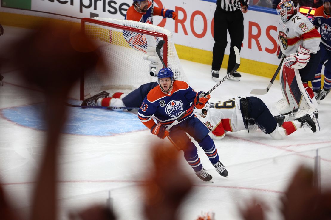 Mattias Janmark of the Edmonton Oilers celebrates after scoring a goal against the Florida Panthers during the first period of Game Four of the 2024 Stanley Cup Finals.