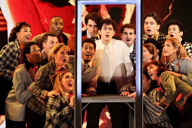 Ali Louis Bourzgui and the cast of "The Who's Tommy" performs onstage.