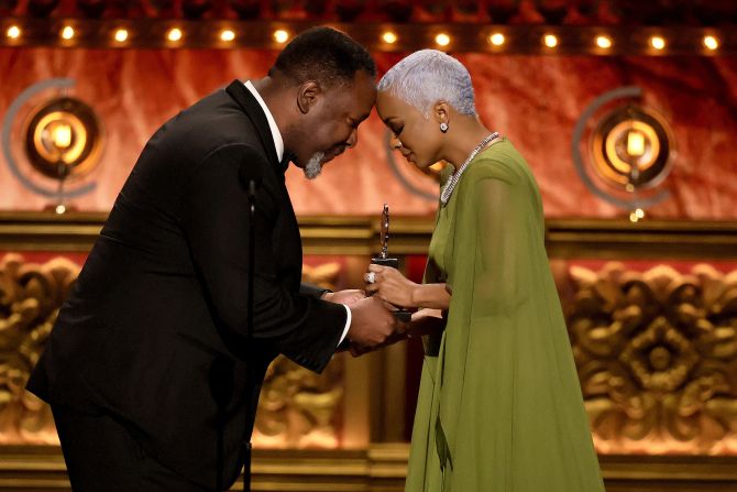 Kara Young, right, accepts the award for best performance by an actress in a featured role in a play for her role in "Purlie Victorious: A Non-Confederate Romp Through the Cotton Patch" from Wendell Pierce.