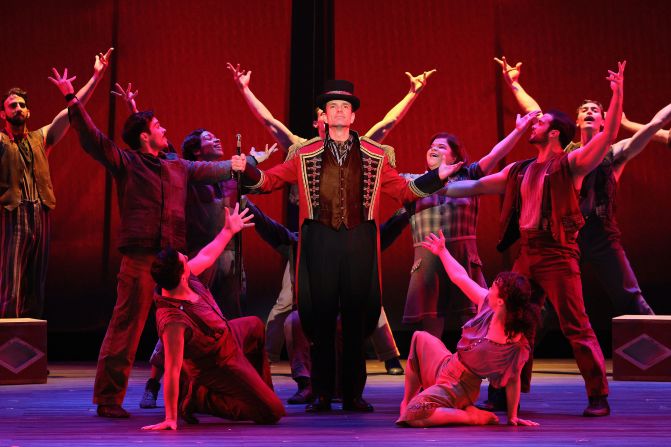 Paul Alexander Nolan, center, and the cast of "Water for Elephants" perform onstage.