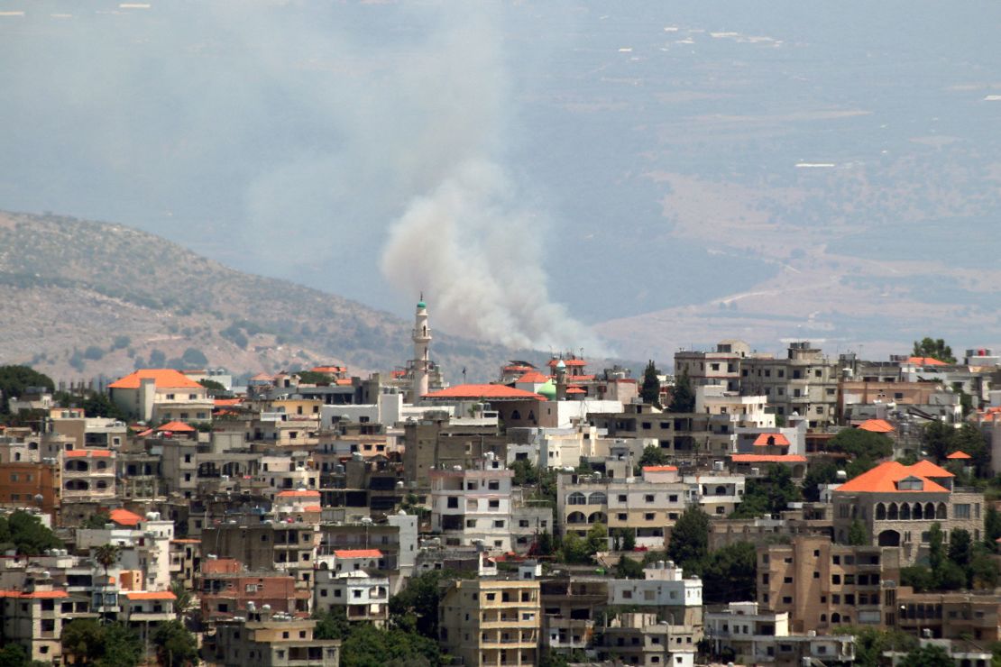 A photo taken from the southern Lebanese area of Marjeyoun, near the border with northern Israel, shows plumes of smoke rising from an area targeted by rockets fired from the Lebanese side which hit an area in the disputed Shebaa Farms on June 21.