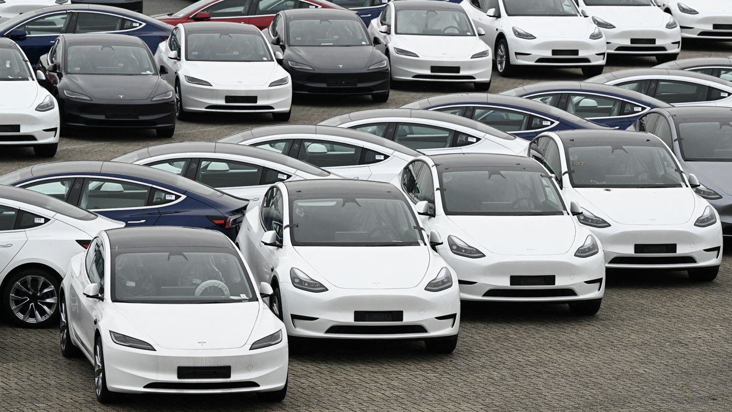 Tesla reports improved earnings CNN Business