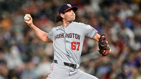 Washington Nationals relief pitcher Kyle Finnegan (67) pitches in the ninth inning during a game between the Washington Nationals and the Colorado Rockies at Coors Field on June 22, 2024 in Denver, Colorado.