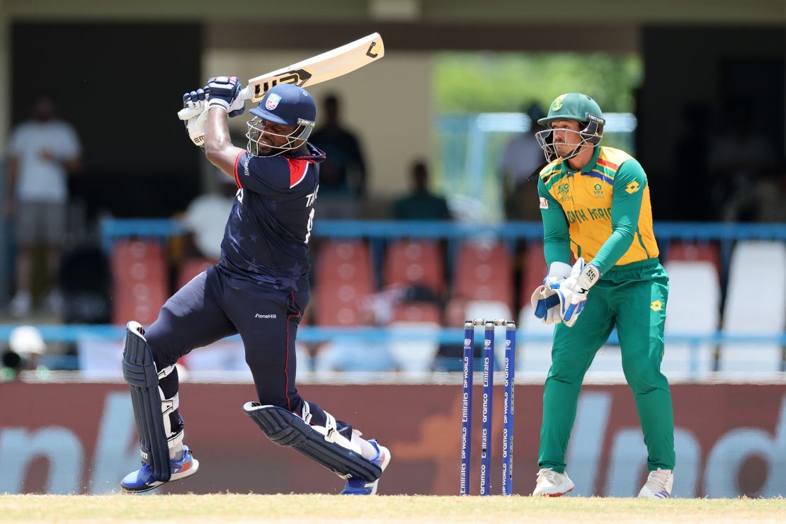 ANTIGUA, ANTIGUA AND BARBUDA - JUNE 19: Steven Taylor of USA bats as Quinton de Kock of South Africa looks on during the ICC Men's T20 Cricket World Cup West Indies & USA 2024 Super Eight match between USA and South Africa at Sir Vivian Richards Stadium on June 19, 2024 in Antigua, Antigua and Barbuda. (Photo by Jan Kruger-ICC/ICC via Getty Images)