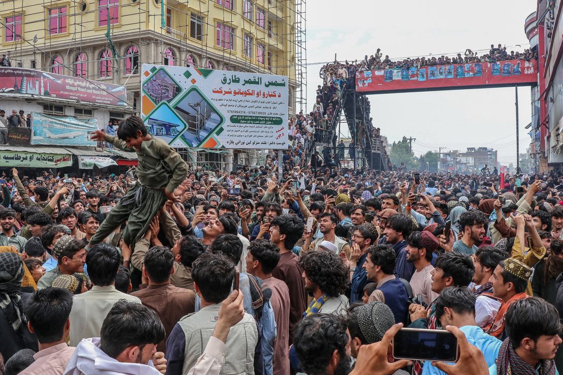 Afghanistan fans celebrate the team's win against Bangladesh at the T20 World Cup.