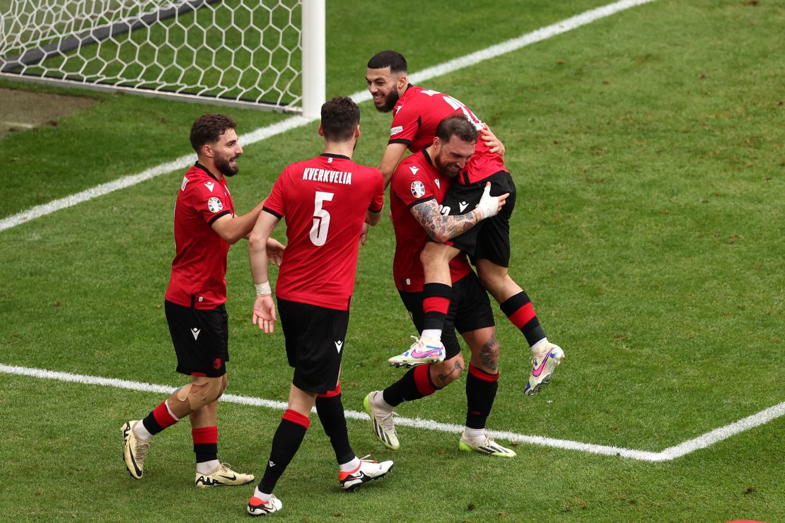 Mikautadze celebrates after scoring against Czech Republic.