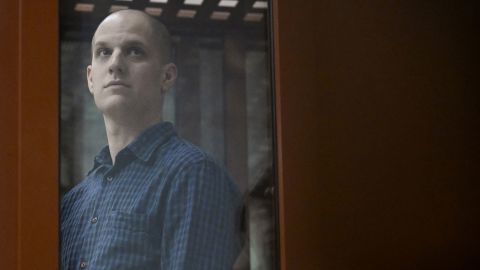 US journalist Evan Gershkovich, accused of espionage, looks out from inside a glass defendants' cage prior to a hearing in Yekaterinburg's Sverdlovsk Regional Court on June 26, 2024. (Photo by NATALIA KOLESNIKOVA / AFP) (Photo by NATALIA KOLESNIKOVA/AFP via Getty Images)